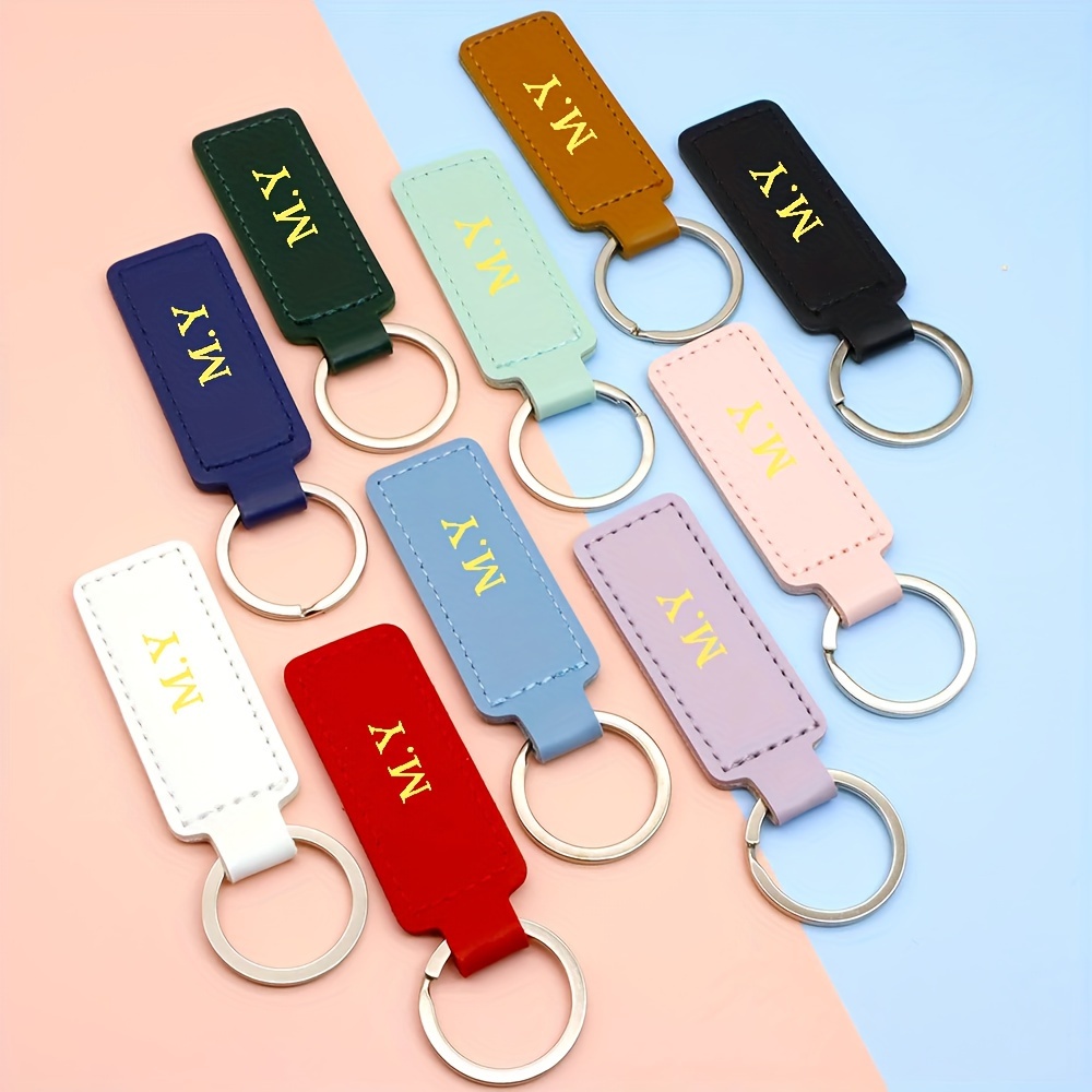 

Personalized Pu Leather Keychain With Golden Monogram Lettering, Alphabet-themed Oblong Key Ring, Single Piece, Tool Use Ideal For Birthday Gifts With Ring