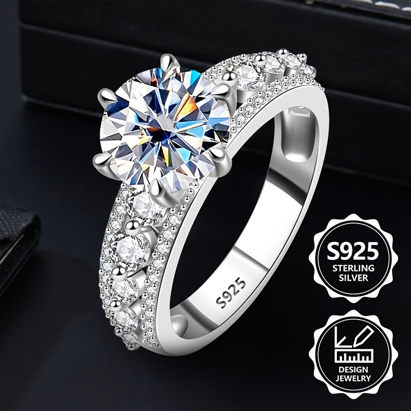 925 Sterling Srebro Skupna Teža Izdelka (3,94 g) Izvrsten Modni Prstan za Dame, Eleganten in , Okrašen z Bleščečimi Moissanit Kamni.