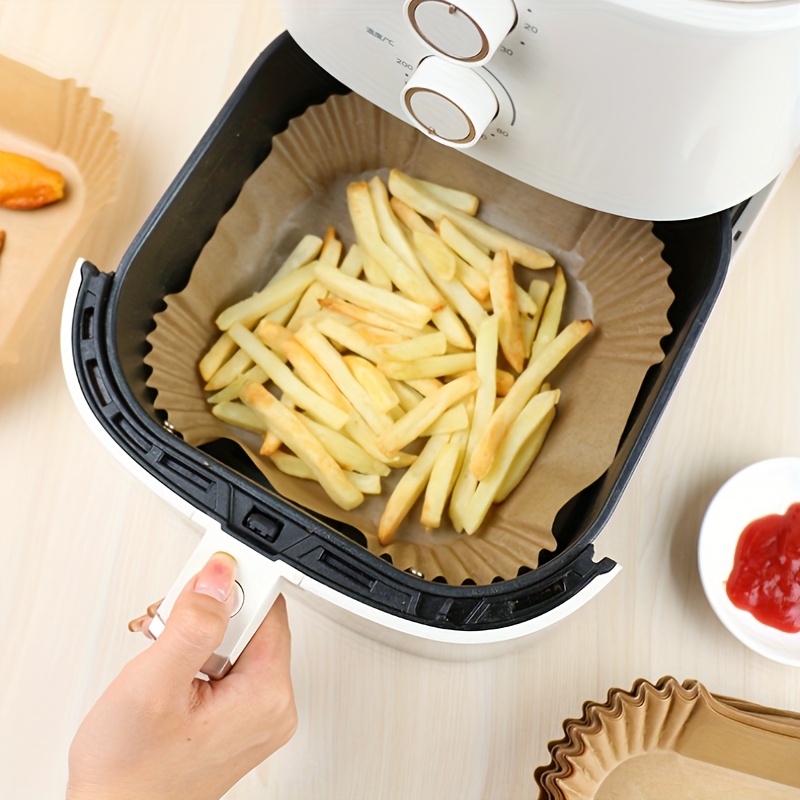 50 100pcs air fryer disposable paper liner air fryer 6 3 7 9 inch liner suitable for 2 8 qt non stick parchment paper for frying baking cooking baking and microwave oil proof tray non stick silicone oil paper kitchen accessories details 7