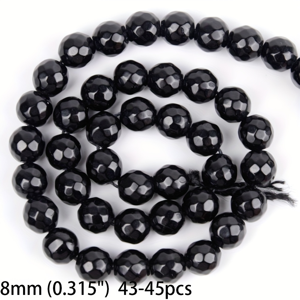 TEMU Une collection de perles et d'assortiments, comprenant une branche de noir facetté et d'onyx, pour la création de et de bracelets. Cet ensemble