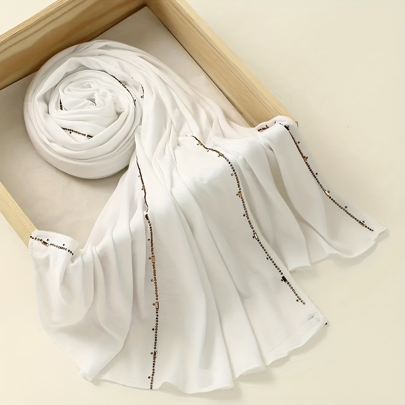 New Modal Solid Color Rhinestone Long Scarf Headscarf, Suitable for Muslim Women to Wear as a Hijab. Made of High-quality, Breathable, and Soft-touch Fabric, Available in Four Classic and Attractive Colors: Black, White, Khaki, and Coffee. Ideal for