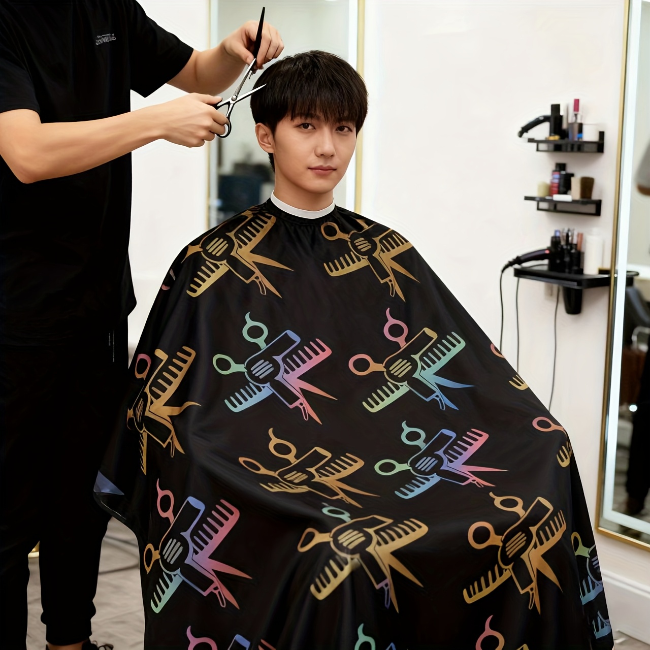 a colorful hair salon wrap with adjustable neckline suitable for hair salon