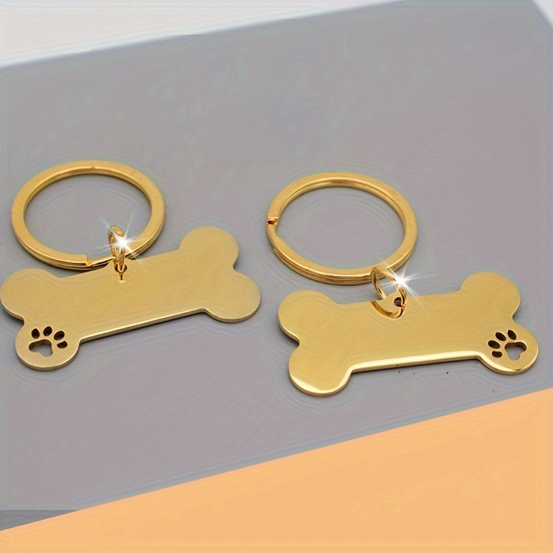 

1pc Golden-tone Stainless Steel Pet Id Tag - Bone & Paw , Keychain Included, Small/medium/large Dogs - , Non-woven Fabric, No Battery Needed