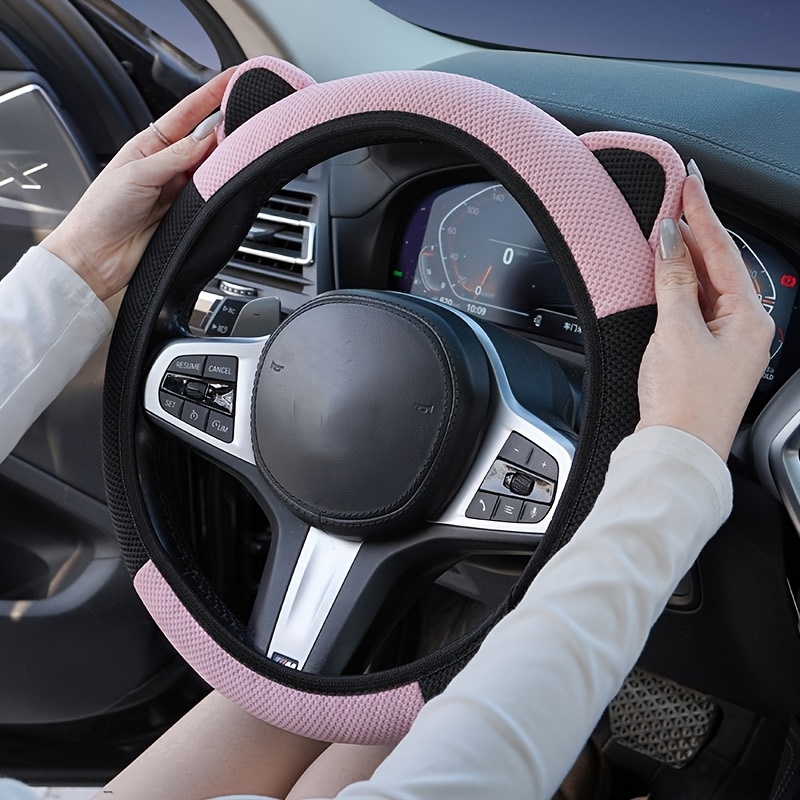 item picture a car steering wheel   of material featuring a delicate ear design sweat absorbing and breathable for summer non slip and durable suitable for sedans suvs   and pickups compatible with 99 of vehicle models