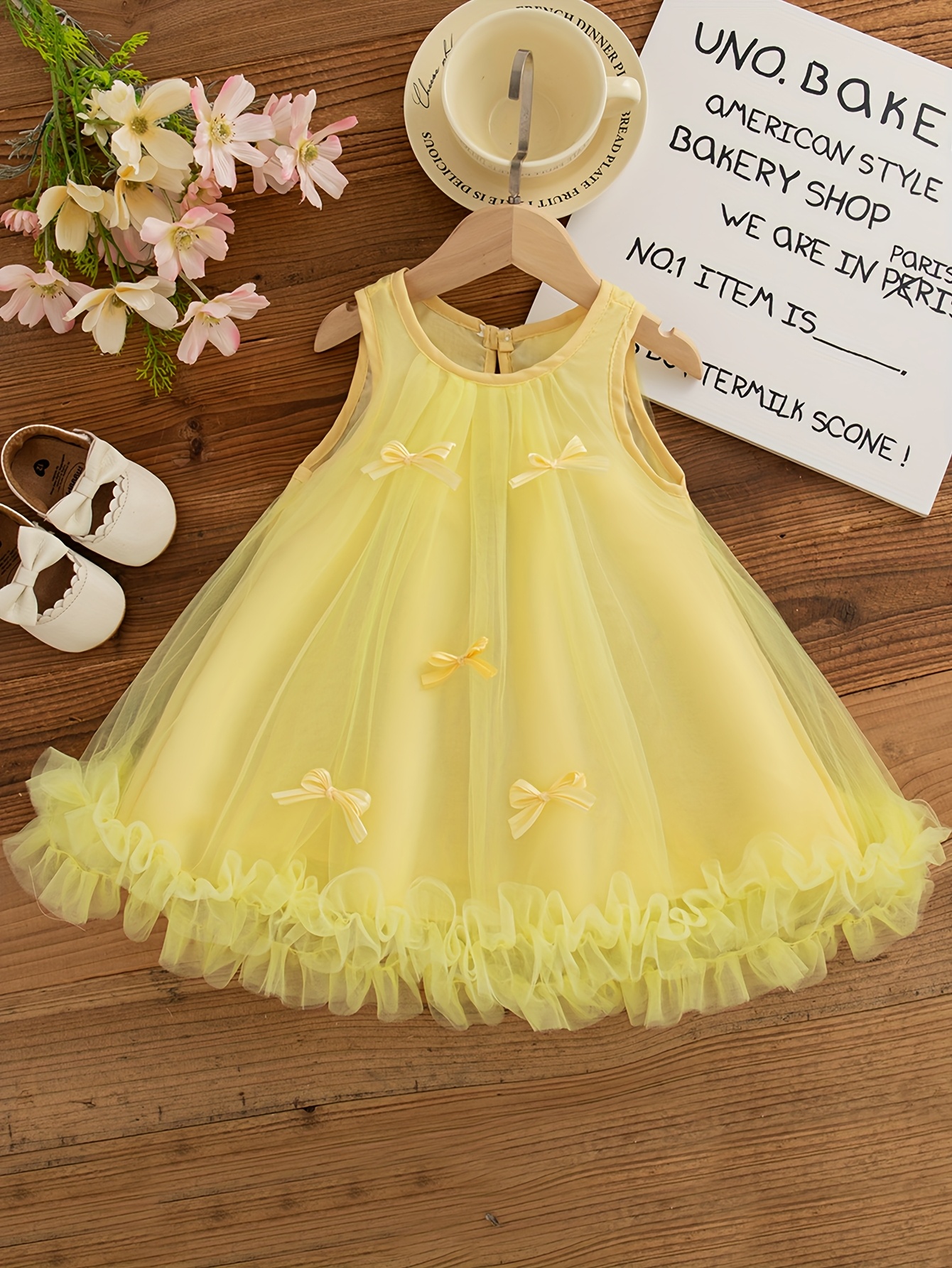 yellow baby dress sold on Temu United States