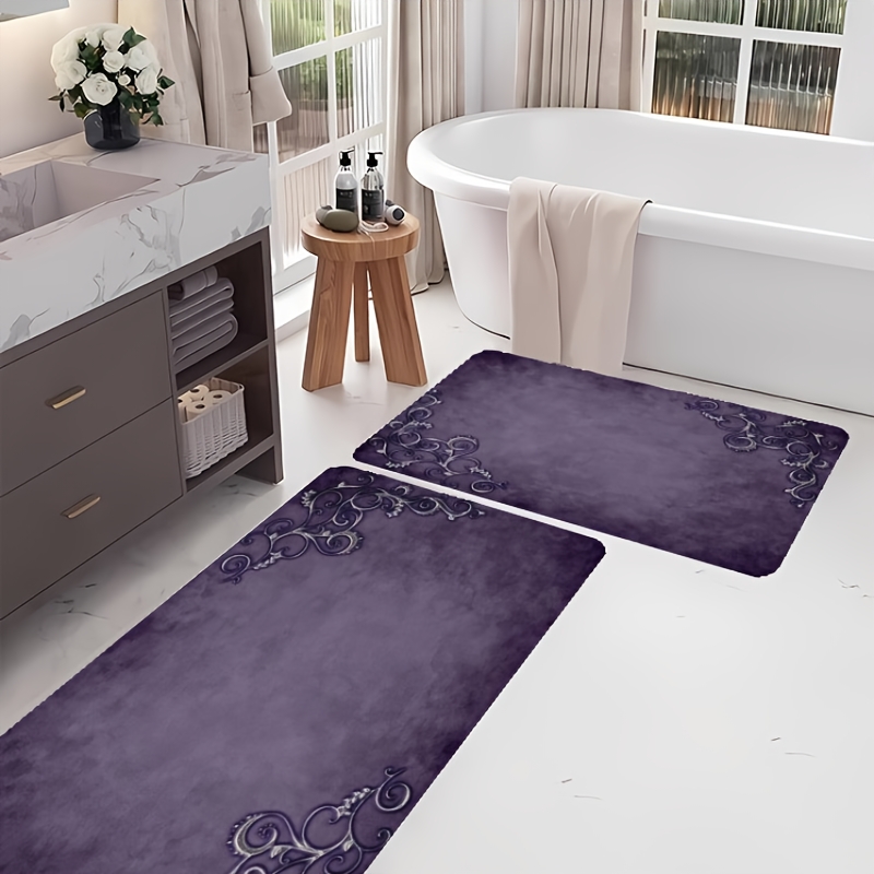 1pc Of A Purple Bath Mat Featuring A Textured Background With Silver Decorative Scrolls In The Corners. This Non-slip Diatomite Bath Mat Dries Quickly