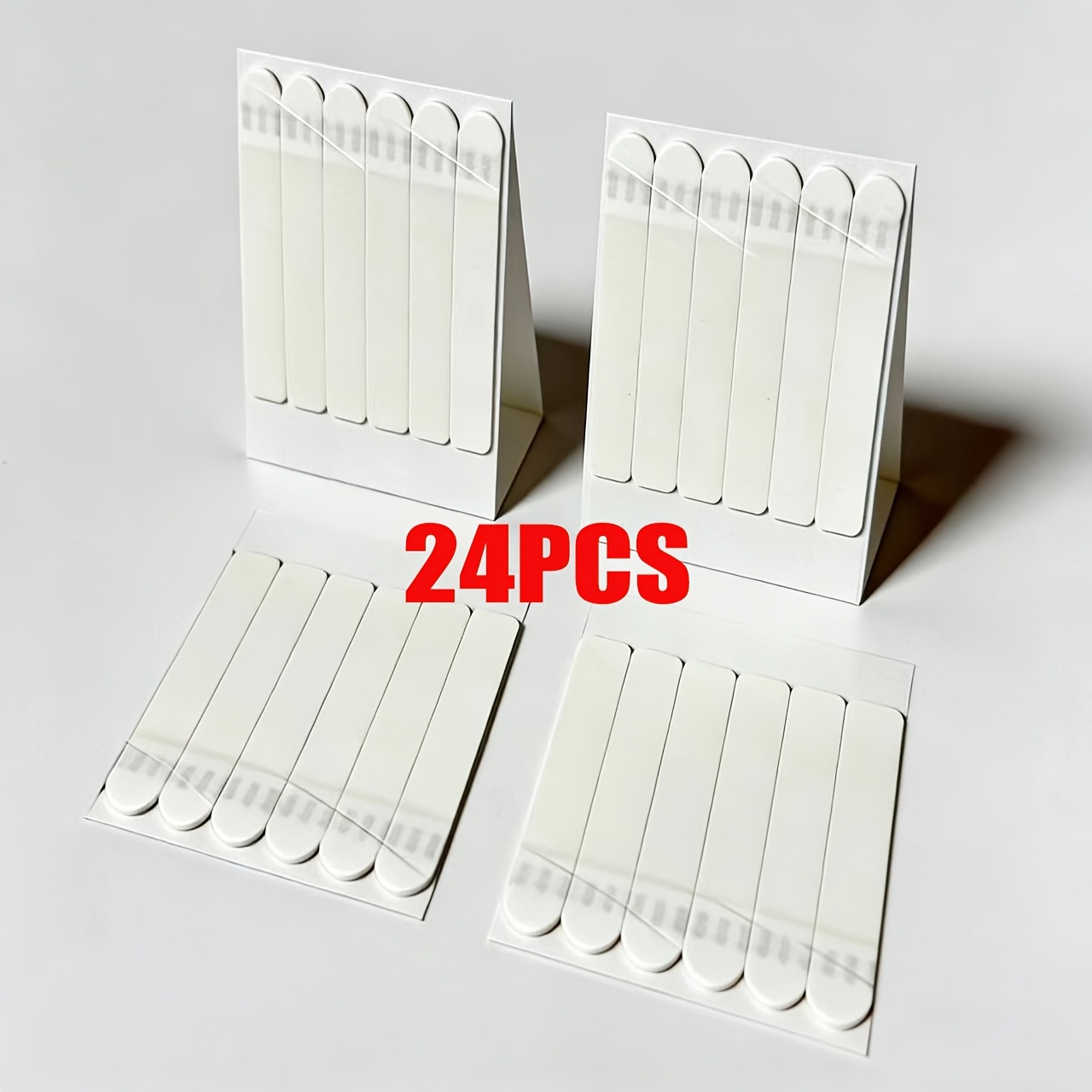 Image of 24pcs Heavy Duty Double-sided Adhesive Strips, Removable Wall Hanging Tape, Ideal For Securing Photos, Picture Frames, Posters, And More, With No Damage To Walls During Installation