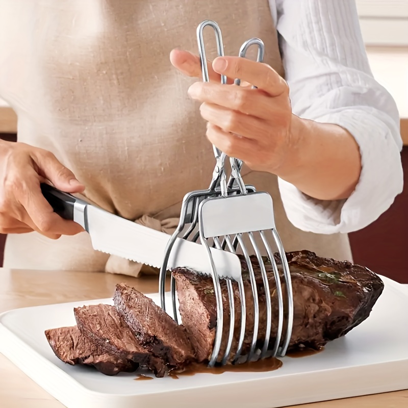 

A Stainless Steel Beef Slicing Tongs For Cutting Meat Slices, Onion And Tomato Clip, Used For Cutting Vegetables And Fruits .