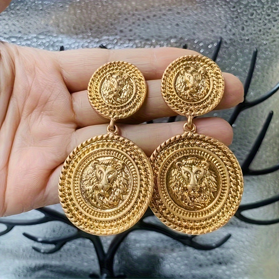 A Set Of Stylish Vintage Earrings Featuring A Round Of A Head, Of Medieval Fashion