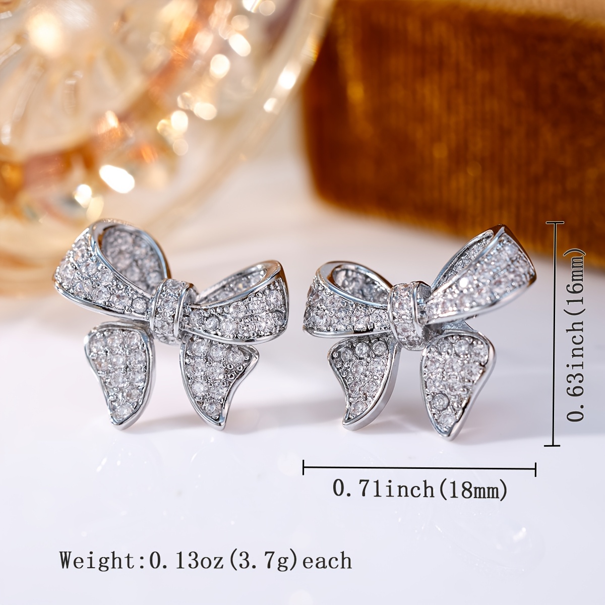 Women's Copper Bow Earrings with Synthetic Zirconia Inlay
