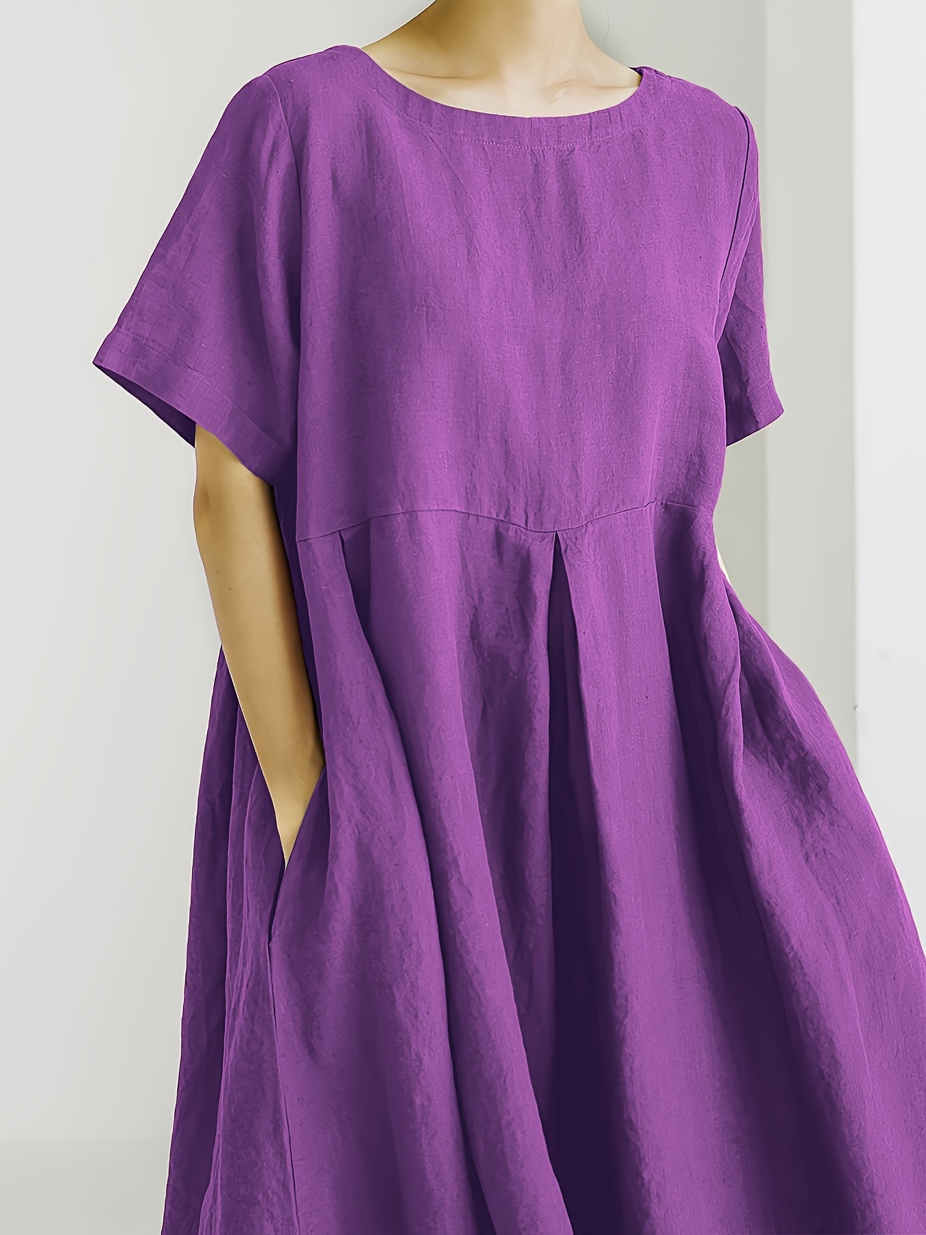 plus size a loose fitting solid color maxi dress for women   and summer featuring short sleeves a round neckline and casual pockets 1