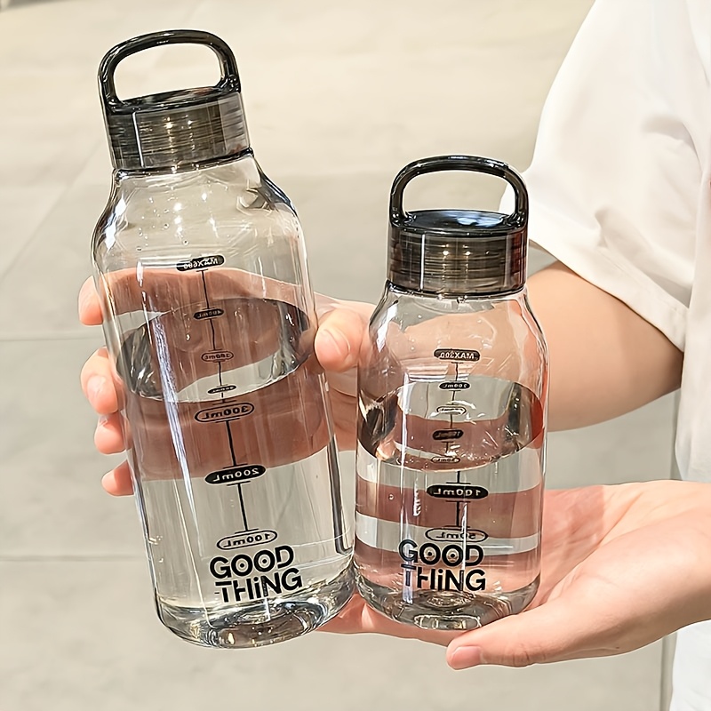   minimalist transparent polycarbonate water bottle leak proof high temperature resistant portable tumbler for school home office outdoor convenient carry durable and stylish for everyday use