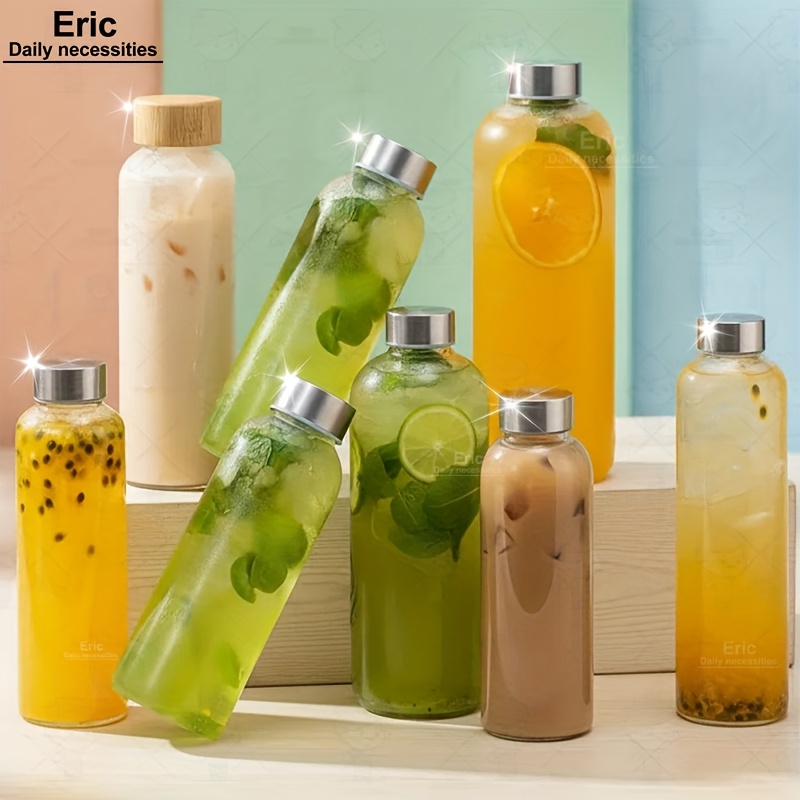 minimalist glass bottles with stainless steel lids and wooden bamboo lids reusable suitable for travel and storing beverages