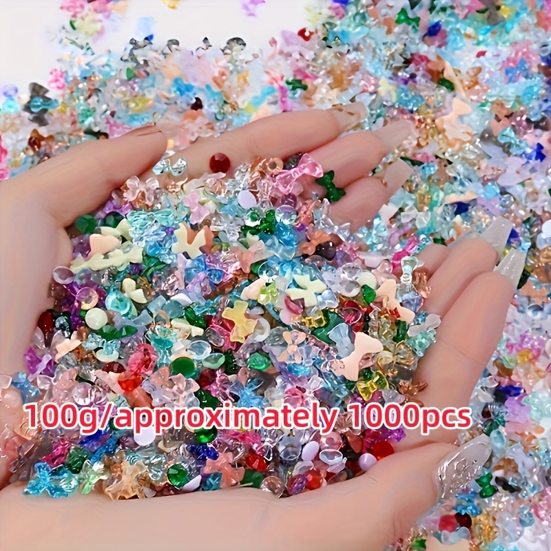 TEMU A 100g Bag Containing Around 1000pcs Of Assorted Colored Resin Nail Decorations, Featuring Designs Such As Heart-shaped Flowers And Bows, Perfect For Nail Art And Phone Case Embellishments