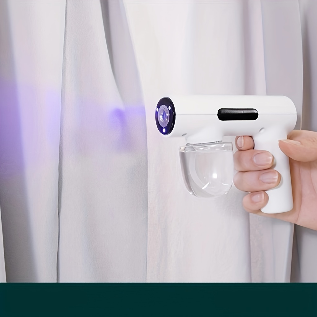 mini portable charging sprayer 50ml   light sprayer hand held powerful sprayer agent   capacity of 1200mah suitable for car school bedroom clothing   delivery and other disinfection Product details 1