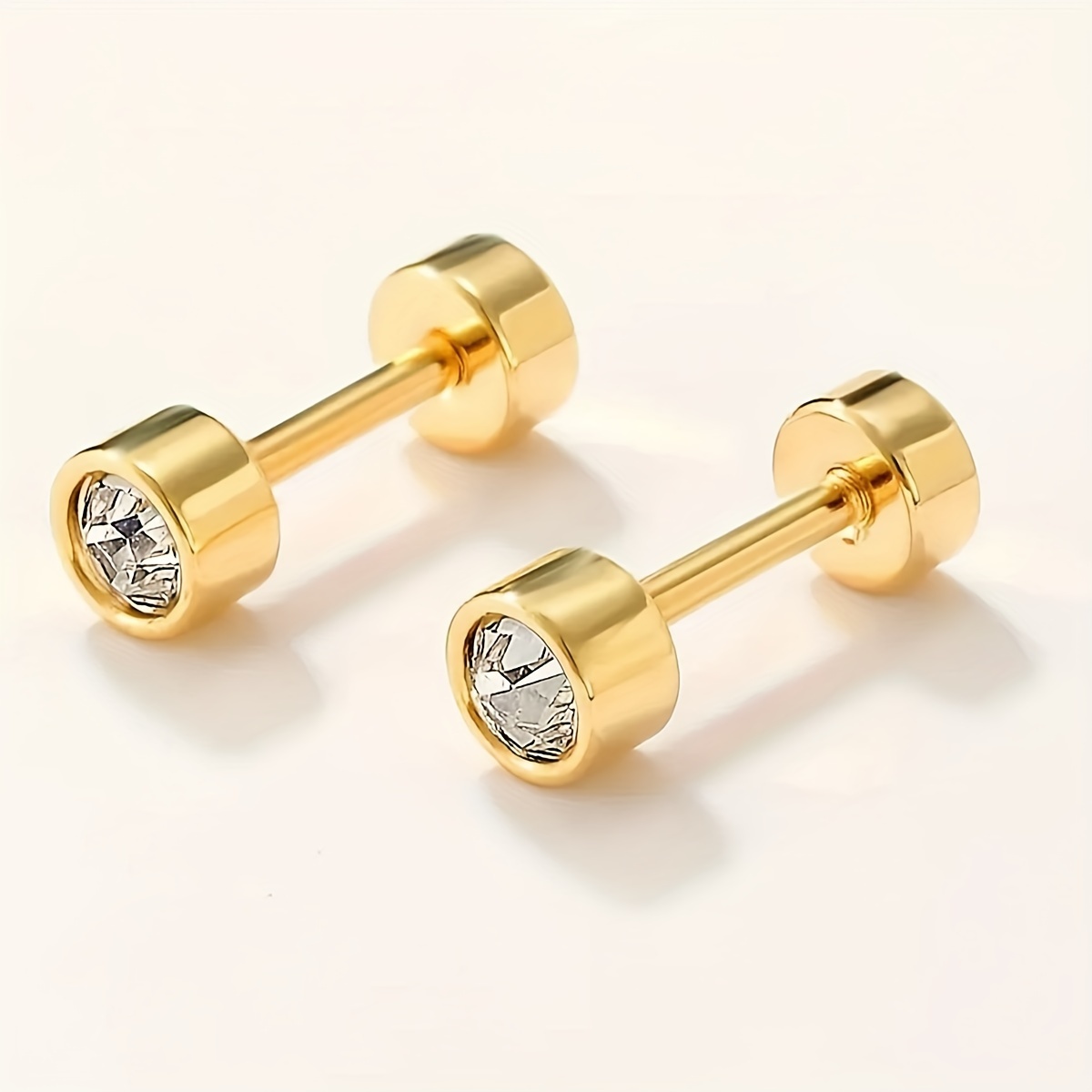 TEMU Un par de aretes redondos minimalistas de acero inoxidable dorado con incrustaciones de circonita sintética