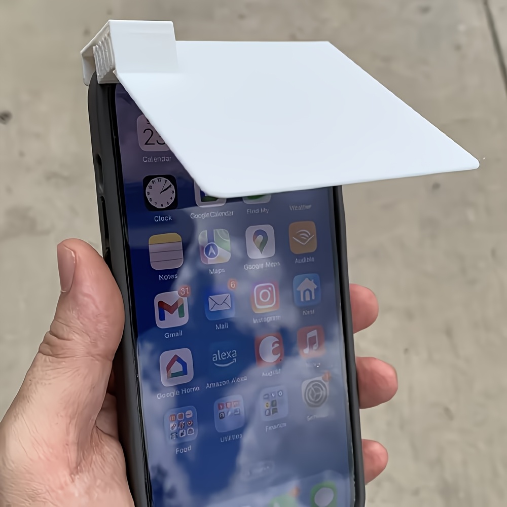 the phone sunshade is a practical accessory designed to enhance screen visibility under   it   reduces sunlight glare allowing   to view the screen     in direct sunlight