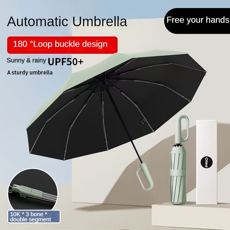 

Parapluie automatique pliable anti-vent et anti-UV avec boucle de fixation, design élégant, compact et polyvalent pour le soleil ou la pluie, idéal pour les voyages en extérieur.