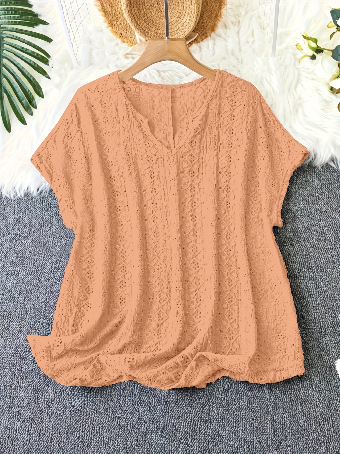 Plus-size summer hollowed-out V-neck bat-sleeve T-shirt for women. There are multiple color options available, and it features a hollowed-out design.