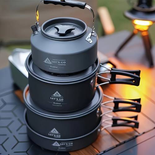 an upscale outdoor cooking set that with for preparing meals while camping or on its stackable design minimizes space and portability
