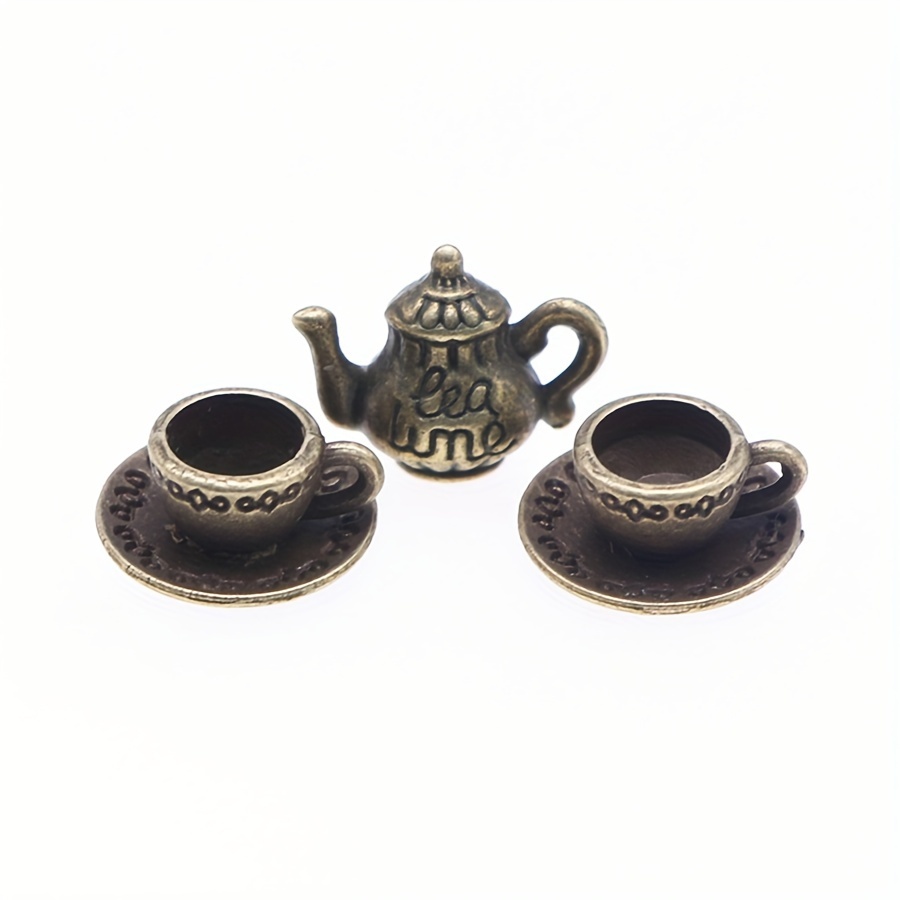 Brass Tea Pot With Cup Saucers