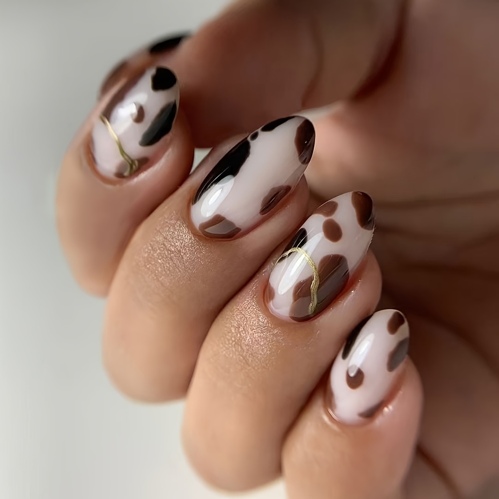 TEMU 24 faux ongles courts ovales à bordure dorée avec imprimé léopard brillant. Ces faux ongles en acrylique à presser s'adaptent parfaitement, ce