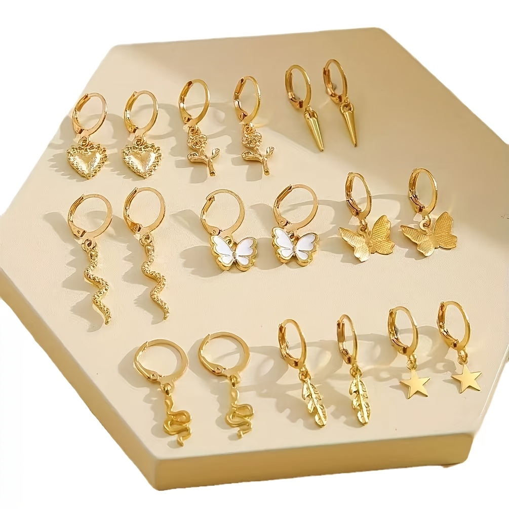 TEMU Juego de 18 pendientes de aro con dijes en tono dorado para mujer, pendientes huggie de , , serpiente, estrella y pluma, joyería para combinar