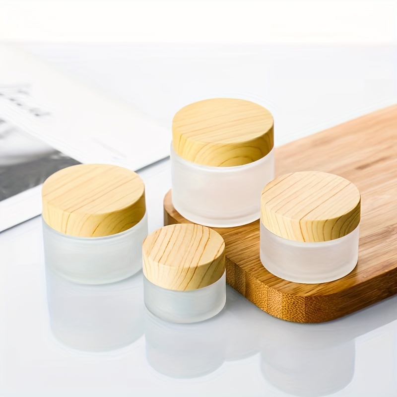 

6pcs Frosted Glass Cream Jar Set With Wood Grain Lids, Refillable Cosmetic Containers For Eye Cream, Rustic Home Decor Storage