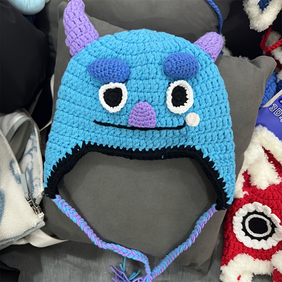 

Blue Monster Crochet Hat With Devil Horns, Handmade Cute Ear-flap Beanie, Unisex Party Cap, Cotton Material, Non-stretch, Knitted Craft, Hook Up Workmanship, No Feathers