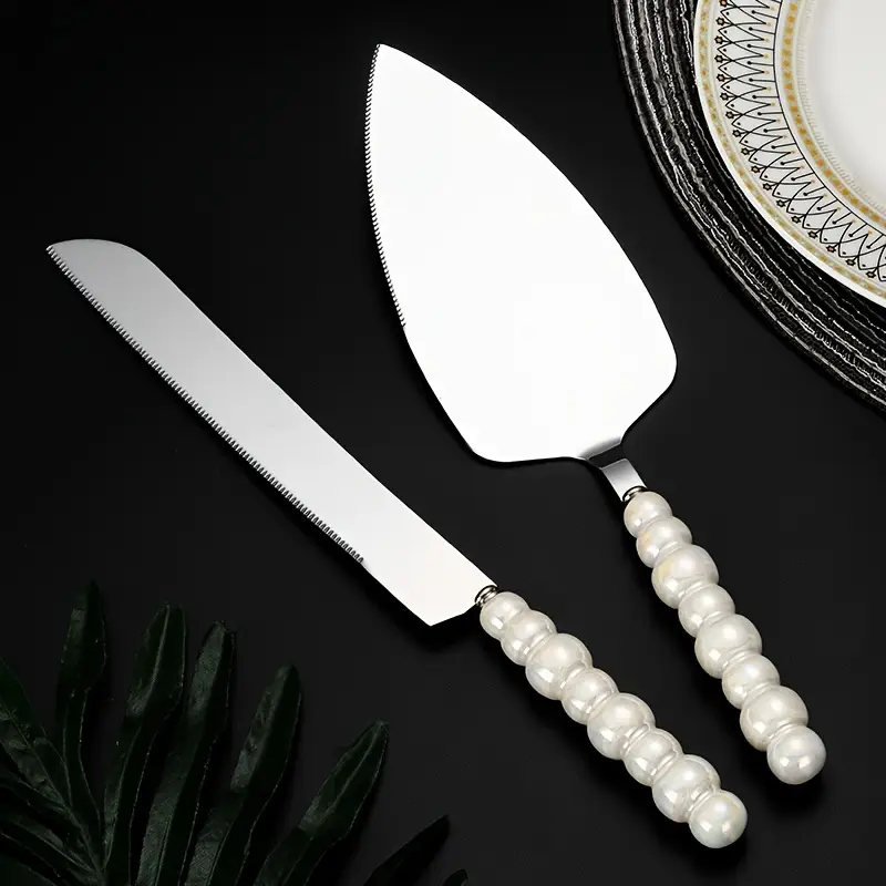 personalized and elegant stainless steel cutlery set with pearl ceramic handle 2 4 cake knife spatula fork set with gift box suitable for kitchen hotel parties birthdays weddings gifting golden and silvery Product details 8