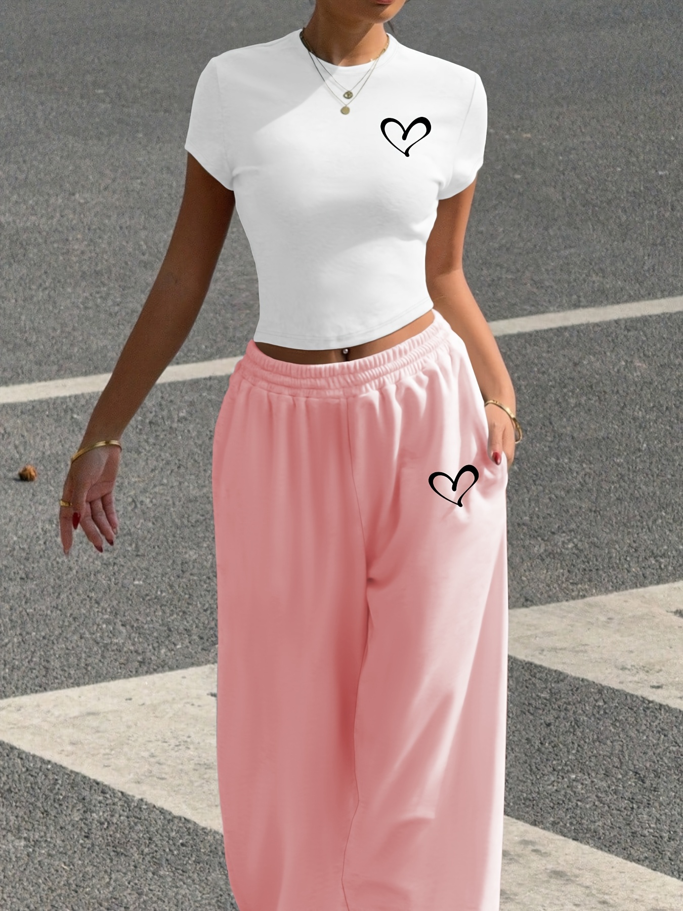 A Stylish Two-Piece Set for All Seasons, Featuring a Heart Print Casual Outfit, Consisting of a Fitted White Short T-Shirt And Tapered Jogger Pants, Machine Washable, Perfect for Street Fashion And Vibes