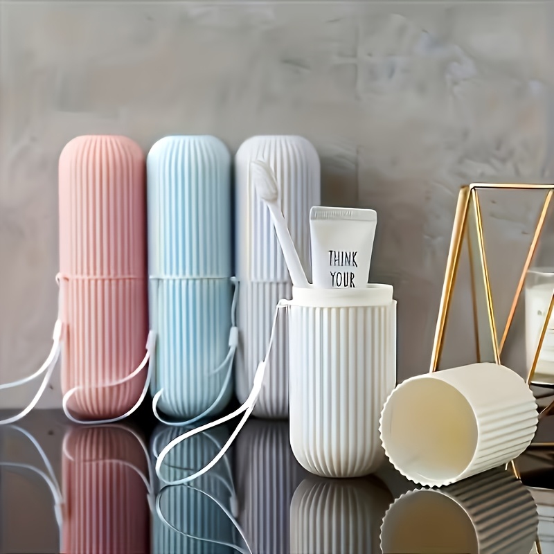travel portable toothbrush cup toothbrush holder and toiletry caddy for travel toothbrush storage and carrying     with a rope in random colors suitable for families travelers and couples it features a fun and  