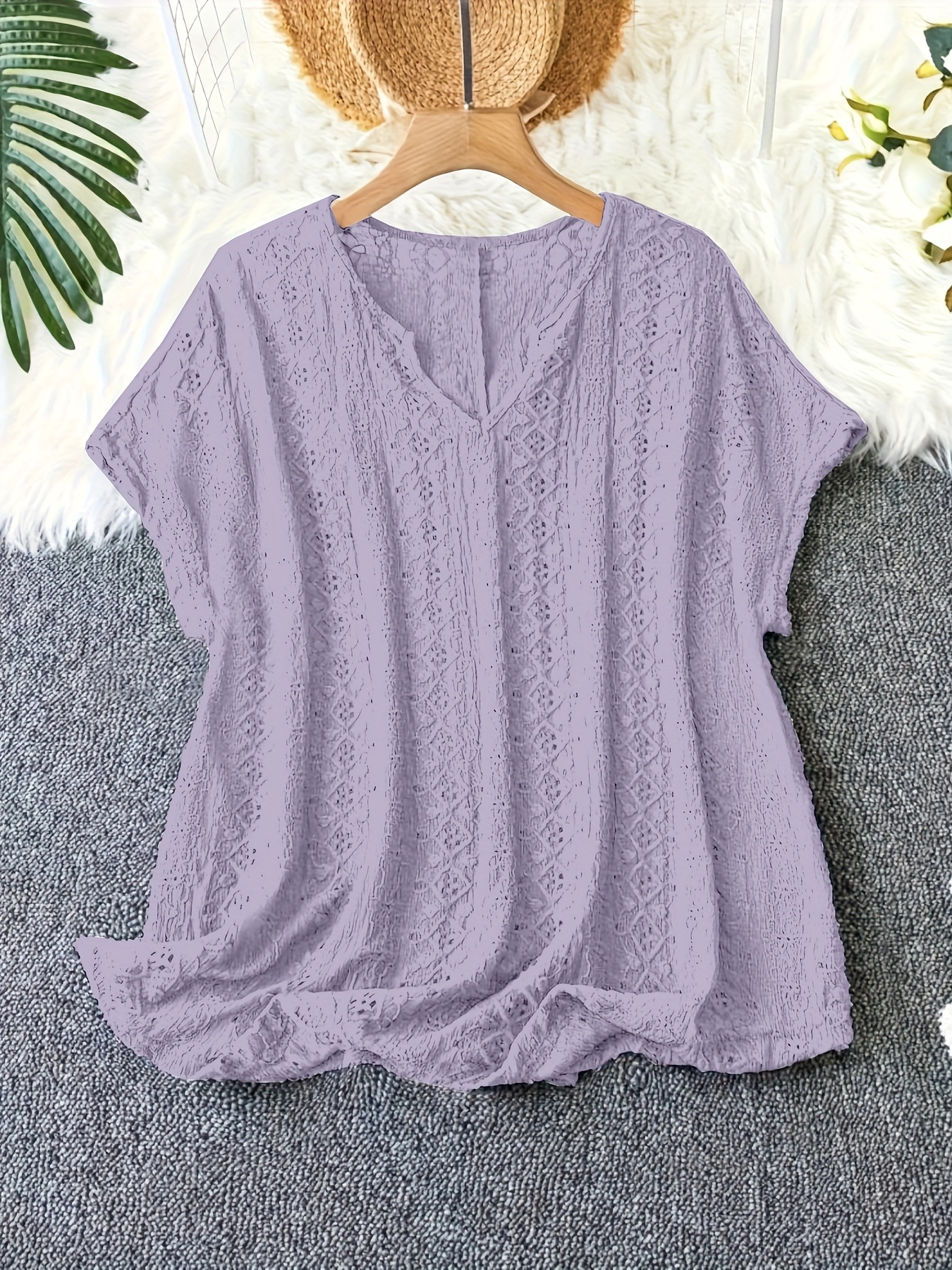 Plus-size summer hollowed-out V-neck bat-sleeve T-shirt for women. There are multiple color options available, and it features a hollowed-out design.