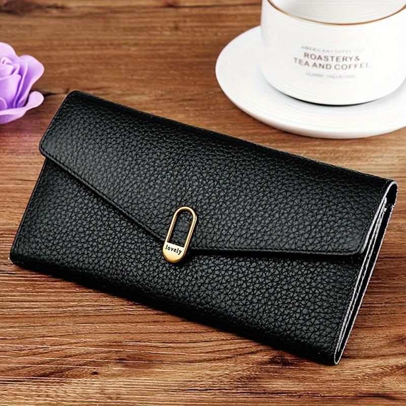 

Sleek Genuine Leather Women’ - Long With Multiple Card Slots, Snap Closure & Zipper Pocket, Black Textured Handbag For Use