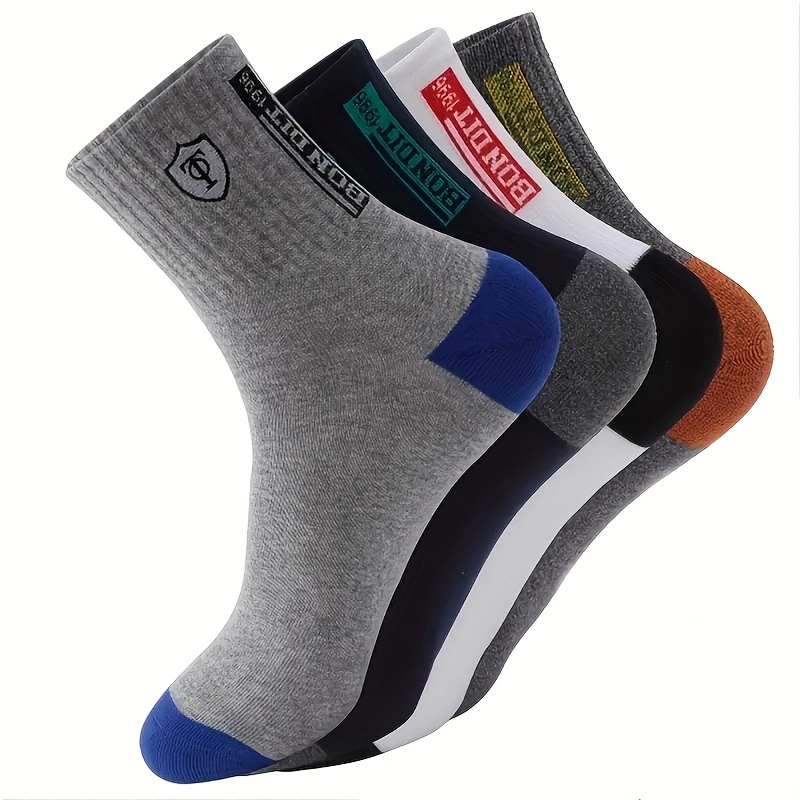 

5 Paires de Chaussettes Hommes Respirantes - Confortables, Douces en Mélange de Polyester, Style Décontracté avec "QUALITÉ VINTAGE " et Autres Graphiques, Pack Multicolore