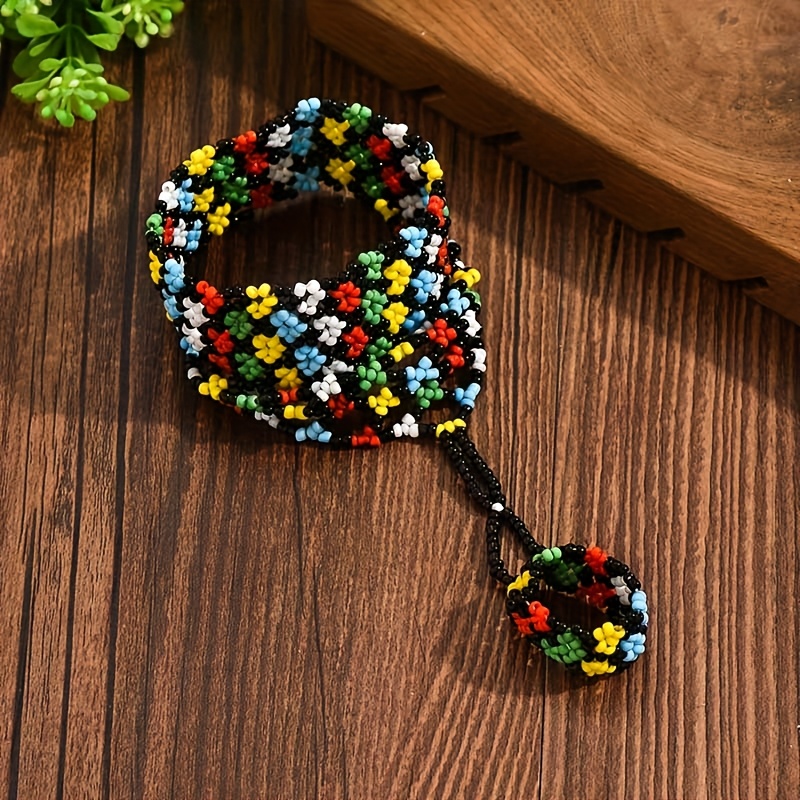 E-shop Böhmische gewebte Perlen Hohle Blume Fingerloses Armband für Damen (Handgefertigte gewebte Perlenmuster können variieren)