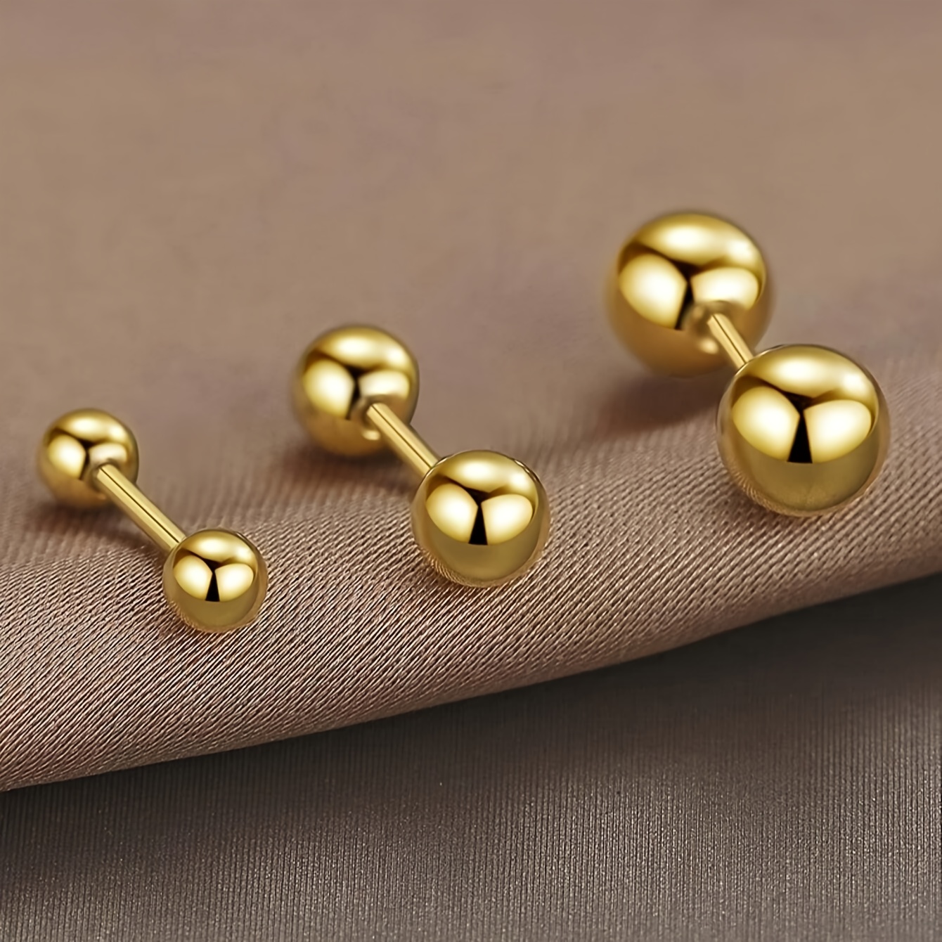 

A Trendy And Stylish Pair Of Unisex Barbell Earrings With Screw Fastening, Mini Golden Bean-shaped Ear Studs.