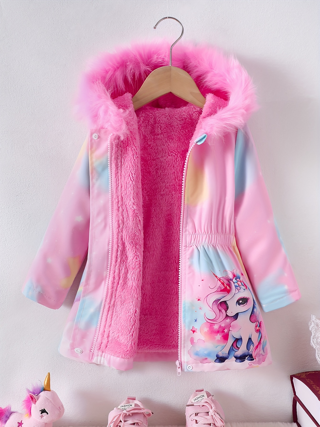 new autumn and winter girls long coat with a fun cartoon unicorn print featuring a   and thick plush material