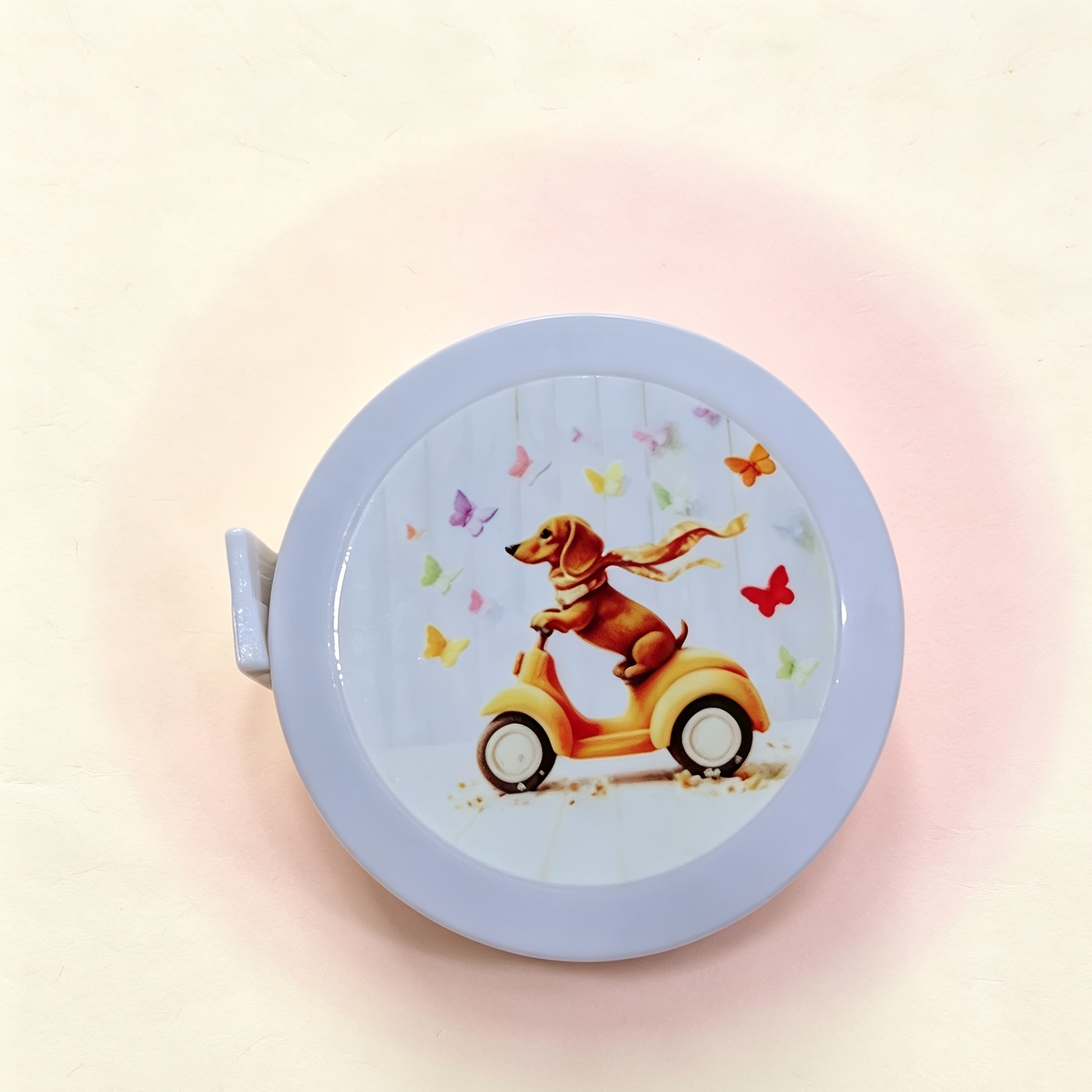 TEMU 1 Portable Mini Retractable Tape Measure (150cm/59in) Featuring A Dachshund Riding An E Bike Suitable For Students, Offices, And Home Use