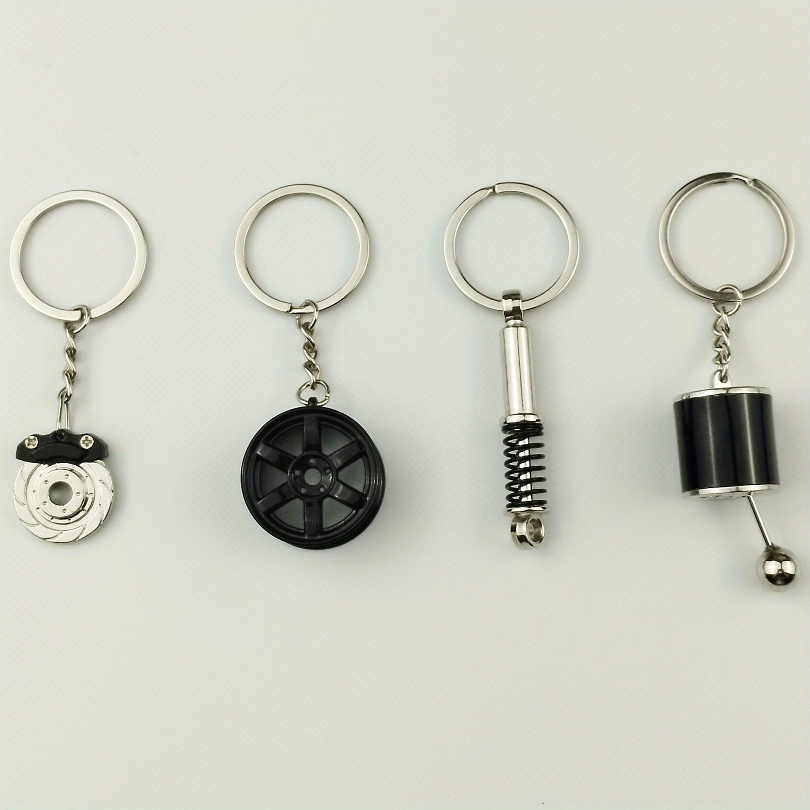 TEMU 4pcs Creative Auto Parts Shaped Keychain, Car Wheel Brake Disc Gear Shifter And Shock Absorber, Gift Keyring Bag Purse Charms