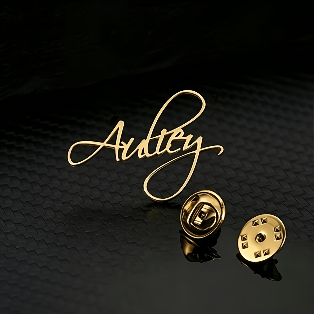 TEMU A Personalized Custom Name Brooch For Women, A Fashionable Self- Hollow-out Letter Name Button Brooch, Available In : Golden, Silvery, And Rose