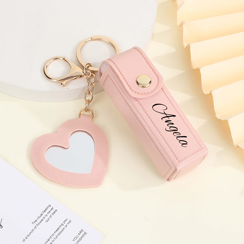 TEMU Étui de baume à lèvres personnalisé gravé au laser, disponible en plusieurs couleurs. S'attache facilement aux sacs ou aux clés, vous gardant