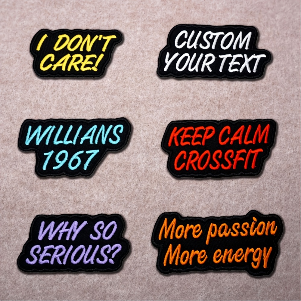 

A Embroidered Patch With Of Text Featuring Irregular Borders, Personalized With Names And Words, With Heat-activated Glue And A Hook-and-loop Backing.