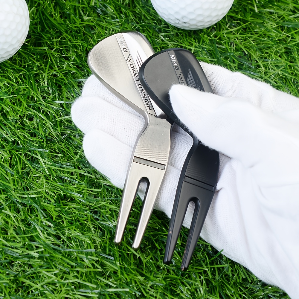 

Innovative Golf Accessory With A Zinc Alloy Golden Material, Designed In The Shape Of A Golf Club For Repairing Grass On The Green.