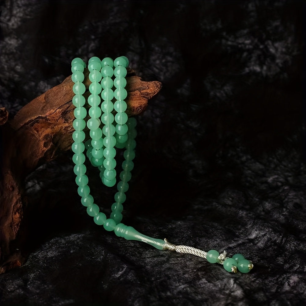 A 99-bead 8mm Bracelet Made Of Luminous Ice-green Stone, Perfect For Men And East To Wear Or Gift During The Ramadan Holiday. A Ramadan