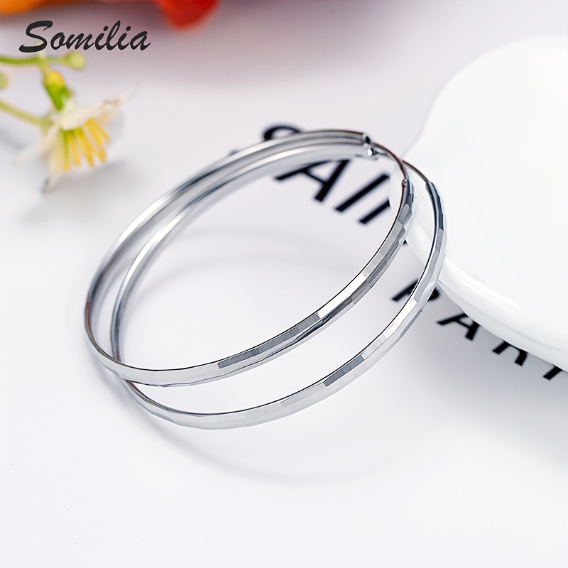 Silver Plated Circular Earrings with Geometric Patterns