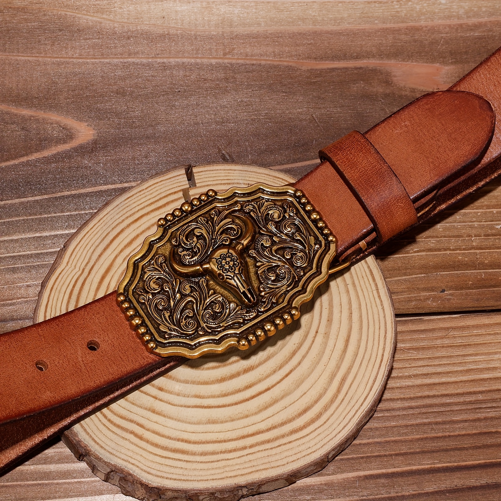 TEMU 's Belt With An American Western Style, Featuring Design Of An Alloy With An Aged End. It Has Engraving Of A Bull's Head Surrounded By Floral