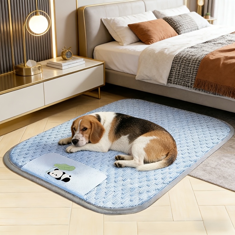 dog cooling mat with ice bead texture fabric featuring gray piping edges and an adorable panda hugging a for lotus leaf pattern printed underneath   designed for pets during summer this cooling pad serves as a summer cooling sleeping mat