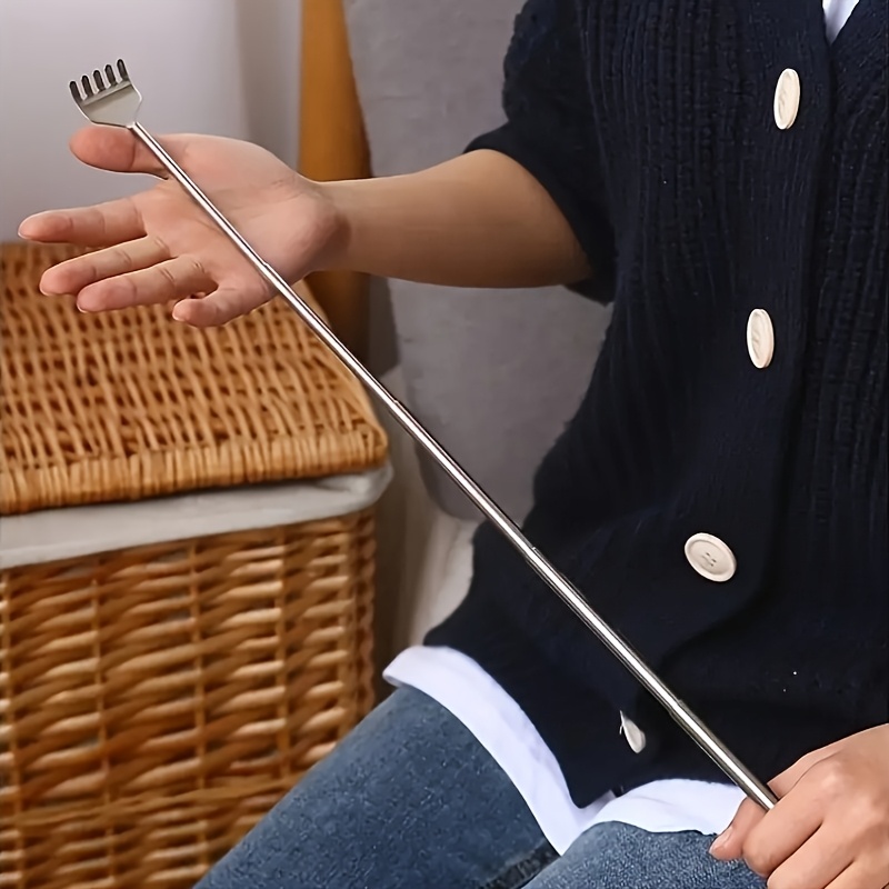 a retractable back scratcher 19 69 inches long made of stainless steel portable with a non designed to be durable and suitable for massage and skincare details 0