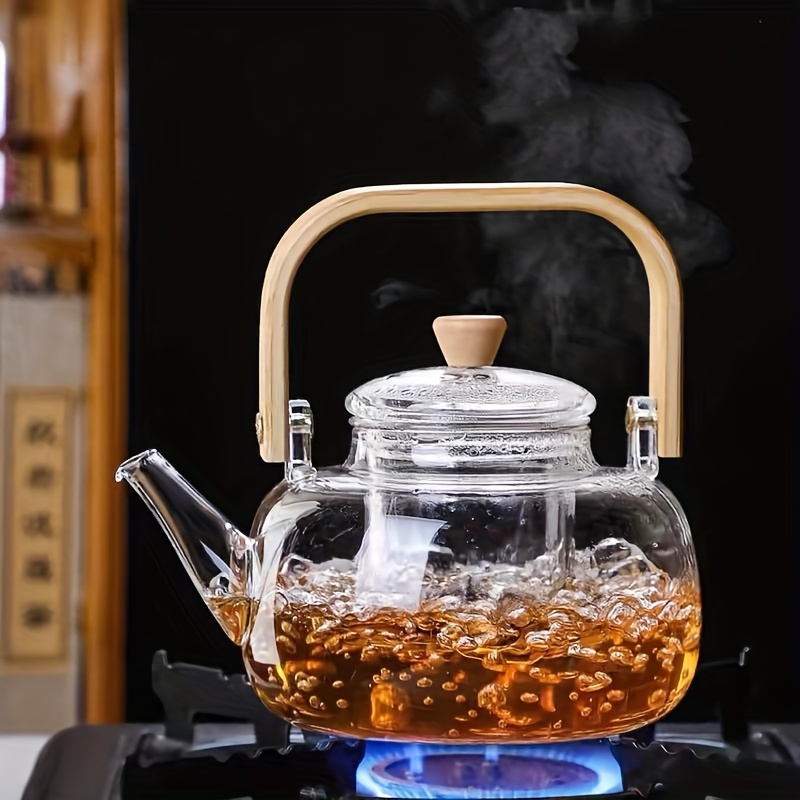 1 db 950 ml-es üveg teáskanna, alkalmas tea főzésére, használható nyitott láng fölé, átlátszó kávésüveg, bambusz fogantyú virágos teához, vízforraló elektromos kerámia tűzhelyre, teáskanna délutáni teához Termék részletei 3